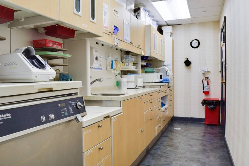 promise-to-our-patients-2 man smiling in dentists chair